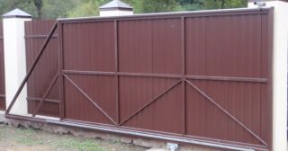 Купить откатные ворота из профнастила Заволжье, цена от 1760 руб.